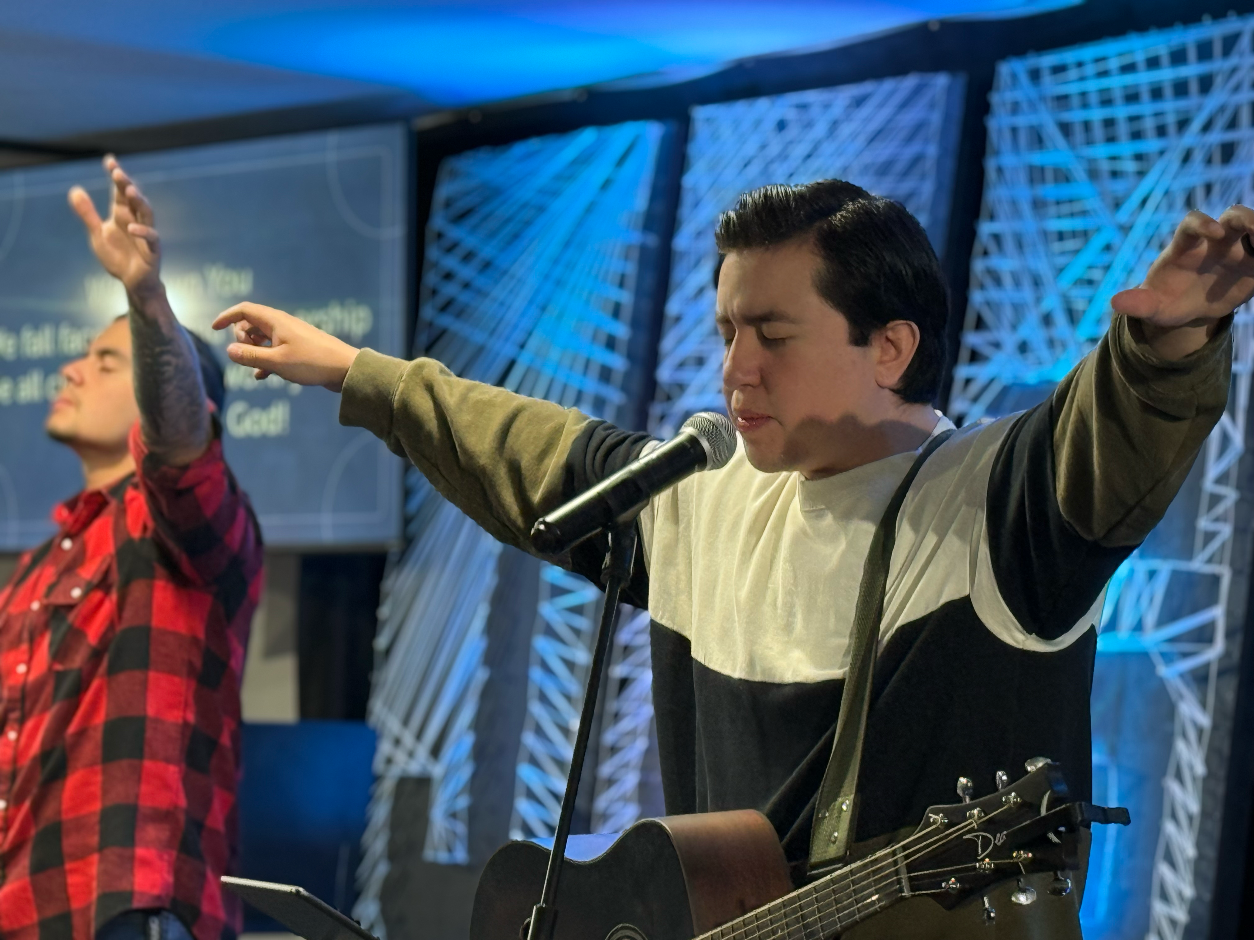 Students worshipping together at youth camp